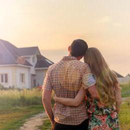 Couple admiring new home purchase